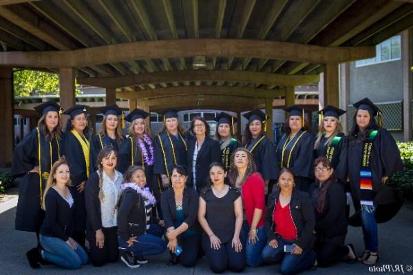 group of graduates under colanade